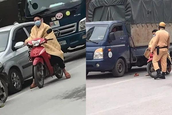 Khoác chăn ra đường chống rét, thanh niên bị công an sờ gáy-1