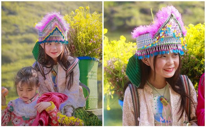 Bé gái Hà Giang gây bão mạng với khoảnh khắc đứng bán hoa cùng em gái-1