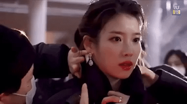 IU cắn răng chịu rét mặc váy dưới thời tiết âm 14 độ quay MV-2