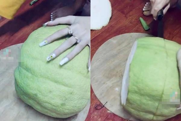 Bổ quả bưởi chưng Tết, cô gái ê chề vì tin lời người bán hàng em ngon lắm-1