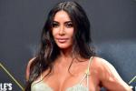 Kim Kardashian khoe răng đính kim cương-3