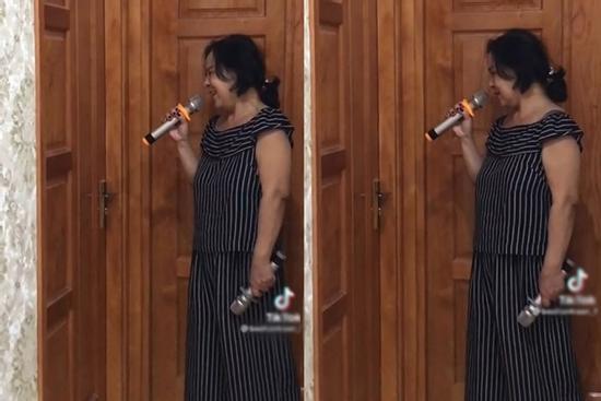 Cười sặc bà nội cầm micro lên tận phòng nhắc cháu gái lười rửa bát