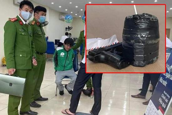 Cầm 'súng, mìn' xông vào cướp ngân hàng ở Hà Nội