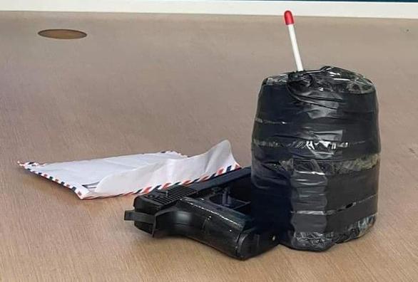 Cầm súng, mìn xông vào cướp ngân hàng ở Hà Nội-2