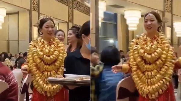Đám cưới cô dâu đeo trăm cây vàng nặng trĩu, bước đi cũng khó-5