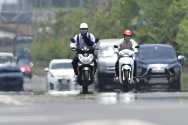 Miền Bắc nắng nóng diện rộng, có nơi 39 độ C-2