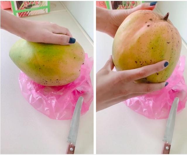 Gọt xoài khổng lồ hơn 3kg, cô gái tức cái lồng ngực khi nhìn bên trong-1