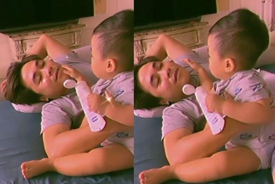 Cưng xỉu khoảnh khắc con trai Hòa Minzy thoa kem dưỡng da cho bố