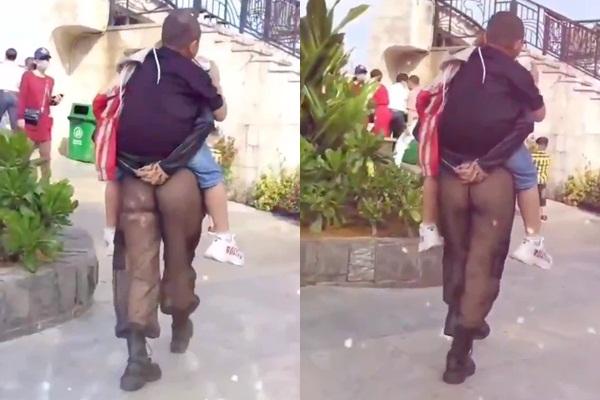 Chị gái nghiện thả rông cõng con rong chơi trong chiếc quần lộ rõ vòng 3-2