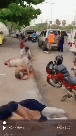 Sự thật về clip người mắc Covid-19 ở Ấn Độ ngã gục, nằm la liệt trên phố-1