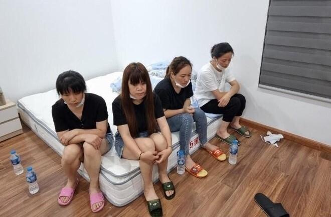 Bắt quả tang 12 người Trung Quốc nhập cảnh chui trong chung cư ở Hà Nội-1