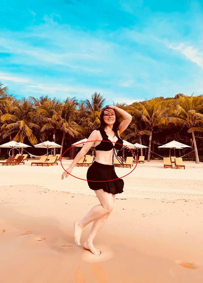 Phi Nhung hiếm hoi tung hình bikini bên trai đẹp nhưng vòng eo cứ sai sai-3
