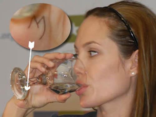 All the meanings of nearly 20 tattoos on Angelina Jolie's body-21