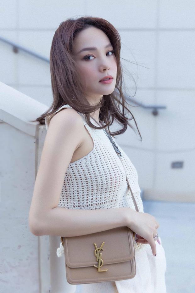 Nhan sắc khác lạ khiến netizen nghi sửa mũi, Minh Hằng lập tức phủ nhận-11