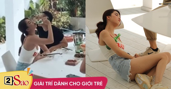 Ngọc Trinh tu rượu cả chai, say khướt nằm vật trên nền đất