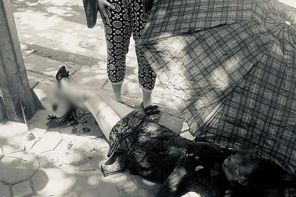 Nghẹt thở cứu bé gái kẹt tay vào xe máy vì vướng áo chống nắng-2