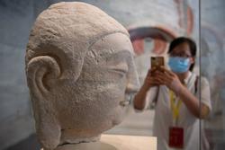 Đầu tượng Phật trở lại Trung Quốc sau một thế kỷ bị đánh cắp