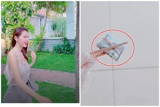 Clip: Thủy Tiên làm gì khi nhìn thấy cọc tiền 100 đô la?