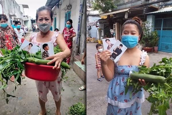 Giữa trưa nắng, cô gái cầm xấp 500k phát người dân về quê-3