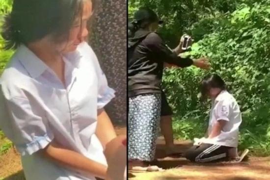 Clip: Nữ sinh lớp 7 quỳ gối giữa đồi thông, bị tát chảy máu mũi