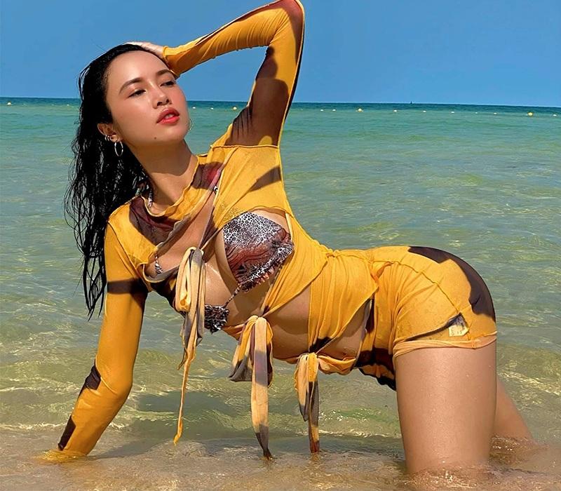 Bikini khoét hiểm của Vũ Ngọc Anh chiếm spotlight Vũ Khắc Tiệp-6