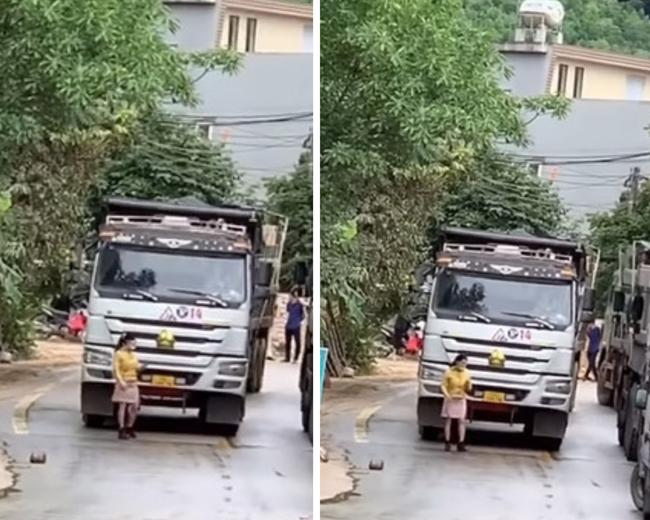 Clip: Mẹ thiên hạ ung dung đi dạo trước đầu xe tải hạng nặng-1