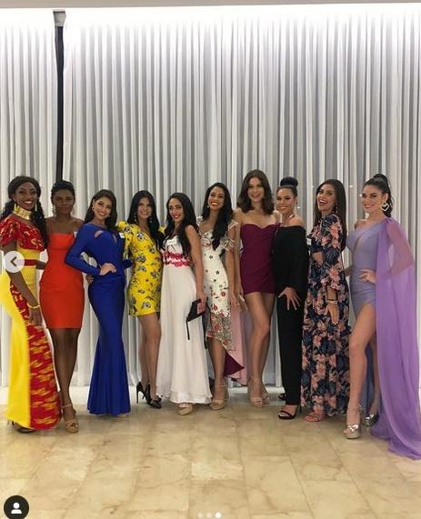 Đỗ Thị Hà lọt thỏm trước chiều cao gần 2m của Miss Dominica-8