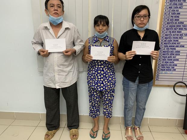 Truy tố 2 vợ chồng cùng con gái tấn công nhân viên y tế ở TP.HCM-1