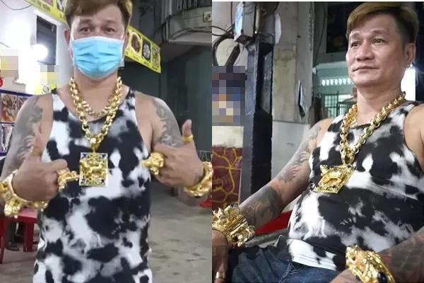 Cặp vợ chồng Sài Gòn gây sốc, đeo vàng kín người đứng bán ốc-1