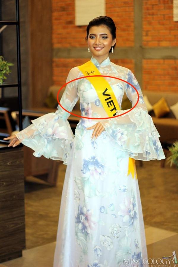 Diện áo dài cách tân với phần tay rườm rà và phần ngực bằng voan mong manh, Miss Crystal Angel International Ngọc Châu khiến netizen chán hẳn.