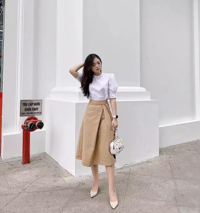 Mặc gì với chân váy màu be để diện mạo xinh xắn chơi Tết?-6