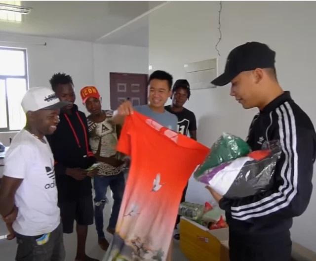 Team Quang Linh Vlogs bring Ao Dai to Africa