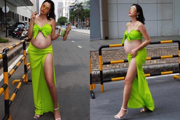 Vbiz’s sexiest pregnant mother shows off her belly