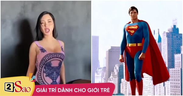 Huong Tram wears a bathing suit in addition to shorts like Superman?