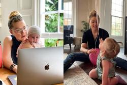 Một năm trở thành mẹ đơn thân của Amber Heard
