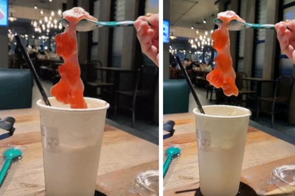 The girl ordered to try a new milk tea topping, when she saw it, she froze for 2 seconds