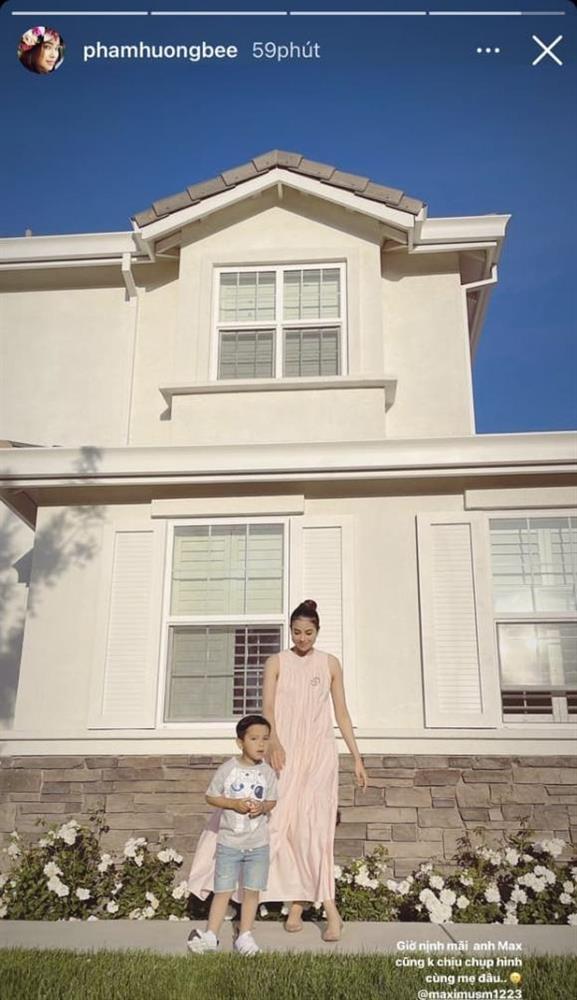 Phạm Hương diện đầm rộng che bụng lùm lùm như bầu lần 3-1