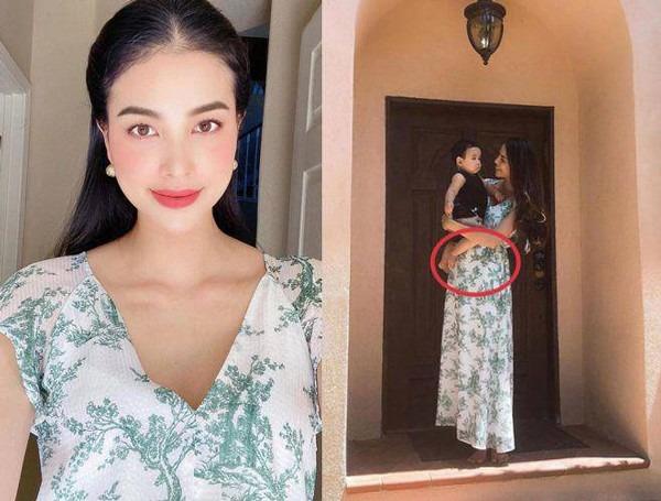 Phạm Hương diện đầm rộng che bụng lùm lùm như bầu lần 3-6