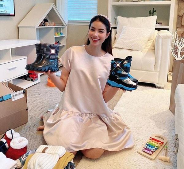 Phạm Hương diện đầm rộng che bụng lùm lùm như bầu lần 3-8