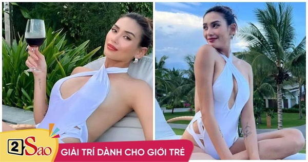 Vo Hoang Yen wears a cut-out swimsuit to show off her breasts three times shrinking
