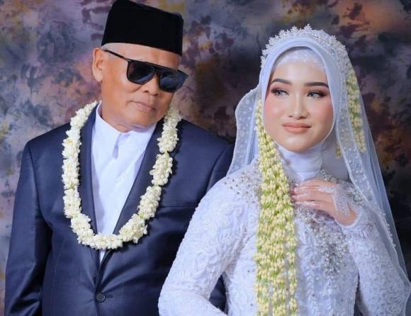 Đám cưới người đàn ông 61 tuổi và vợ trẻ 19 tuổi gây tranh cãi cõi mạng-1