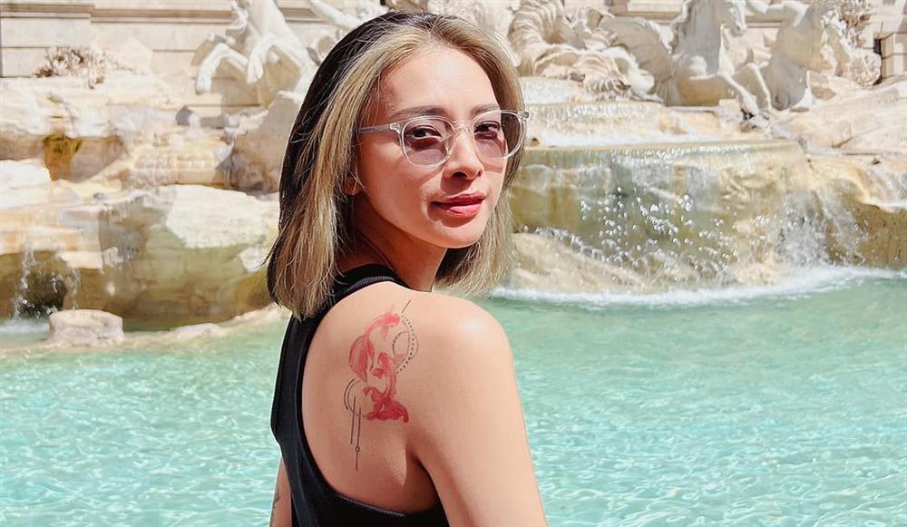 Ngô Thanh Vân hiếm hoi khoe hình xăm cá đôi, liên quan Huy Trần?-4