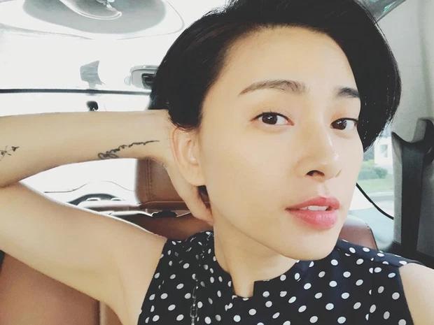 Ngô Thanh Vân hiếm hoi khoe hình xăm cá đôi, liên quan Huy Trần?-12
