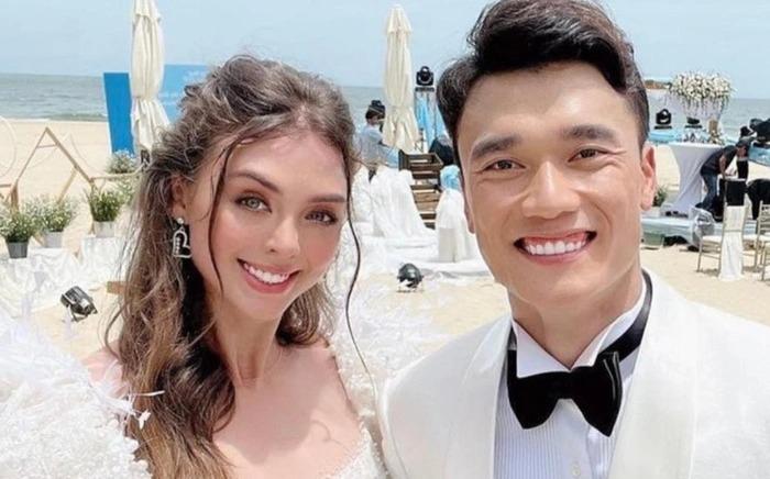 Vợ chồng son Bùi Tiến Dũng ngầm đáp trả tin đồn mang bầu-1