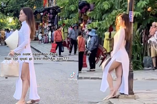 Thai tourists wear ao dai with shorts, contorting in an offensive way in Hoi An