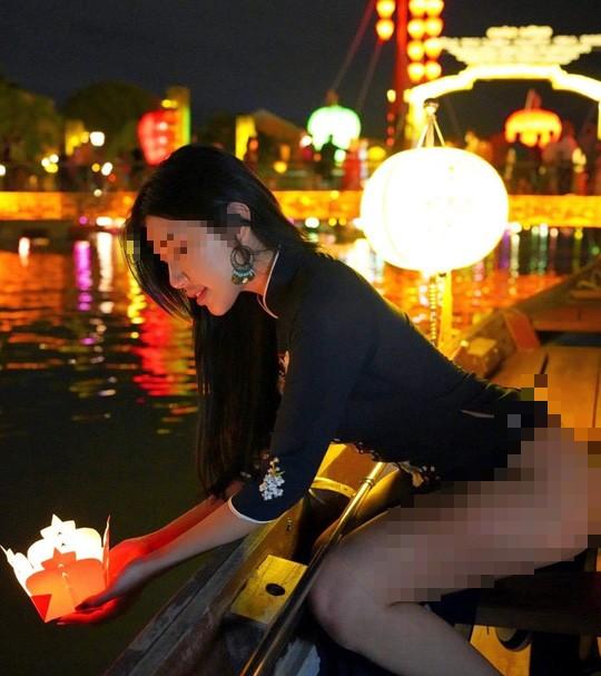 Thai tourists wear ao dai with shorts and squirm in an offensive way in Hoi An-12