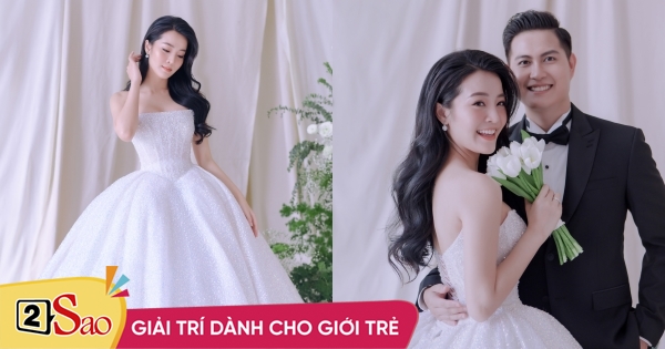 Karen Nguyen wears a wedding dress with more than 1,000 crystals