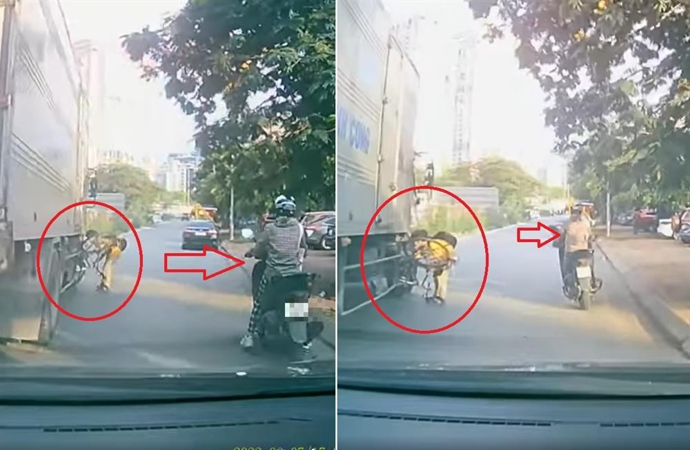 Clip: Bé trai đạp xe đi vào điểm mù của xe tải, người lớn vô cảm?-2