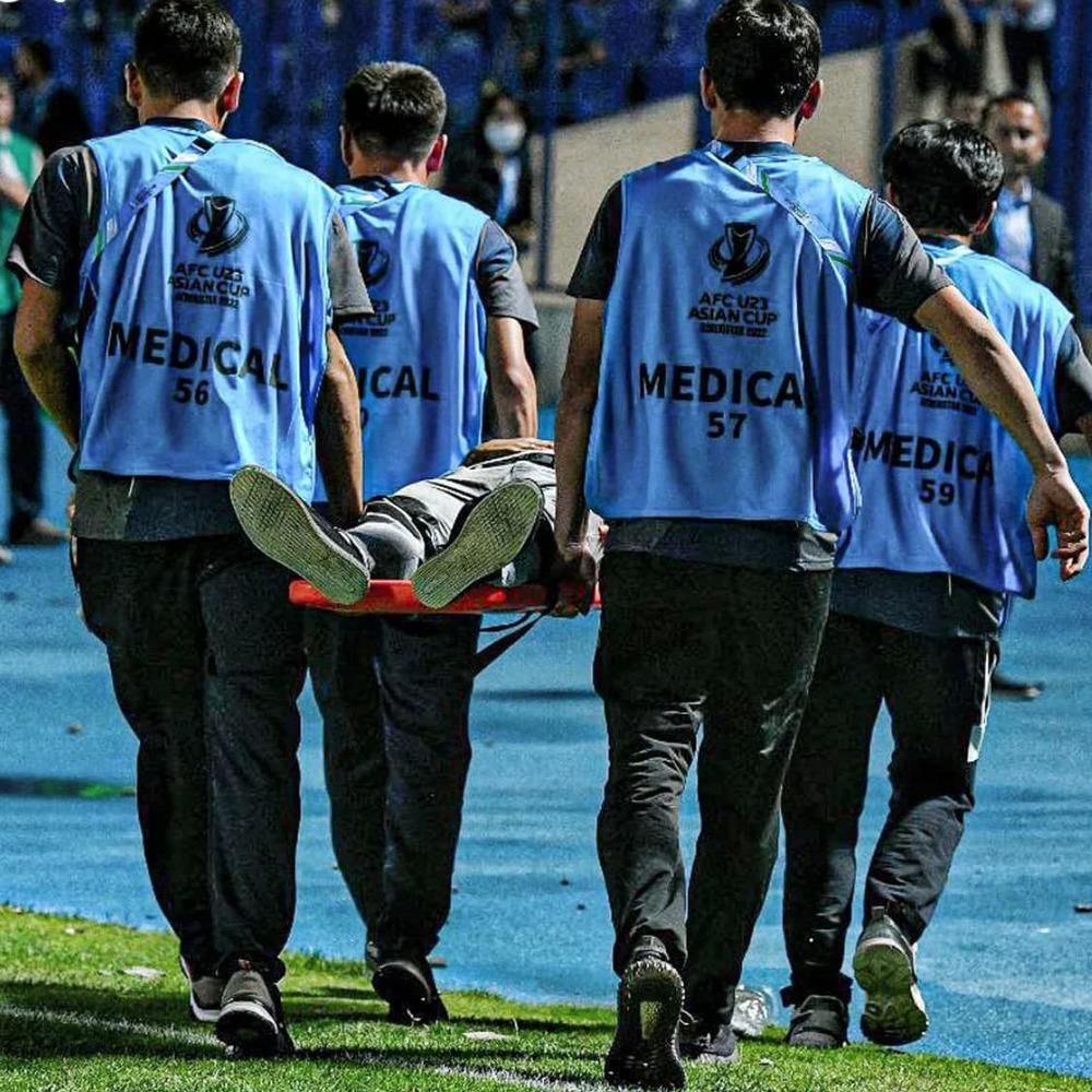 Tác nghiệp VCK U23 châu Á phải đội bảo hộ vì khán đài bạo lực-4