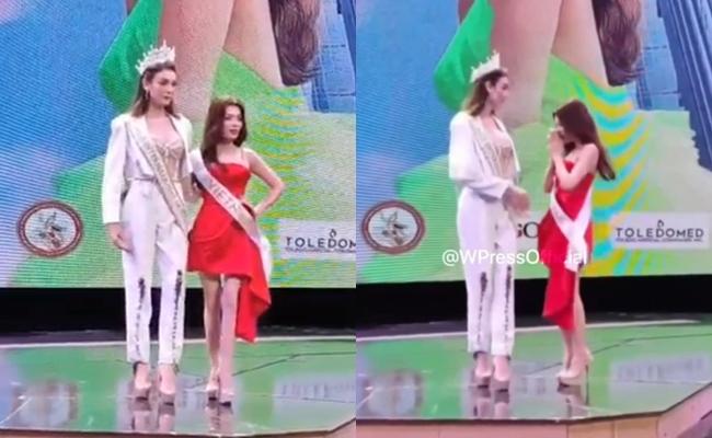 Trân Đài bé như cái kẹo khi đứng cạnh Miss International Queen-2